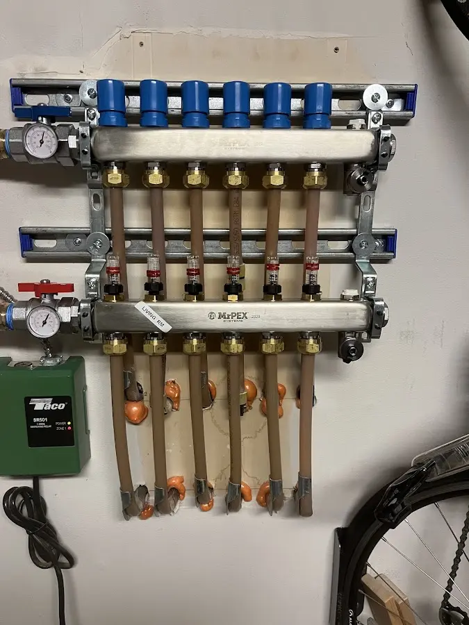 Plumber performing Sink Repair at a residential property in Laurel